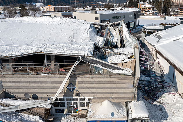 Collapsed roof from winter weather damage