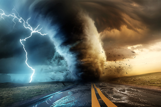 Tornado touching down on a two lane road